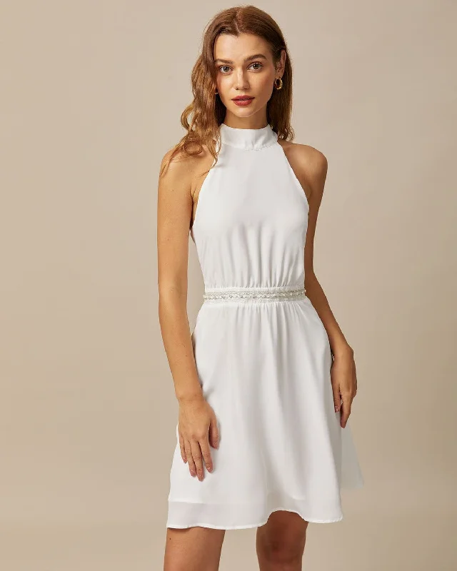 The White Mock Neck Pearls Backless Mini Dress