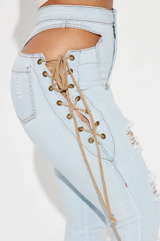 Getting Out There Lace Up Skinny Jeans - Light Wash